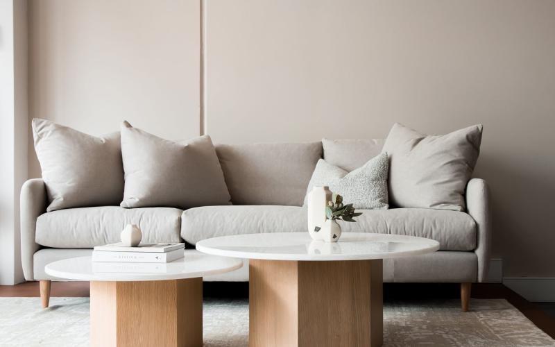 a white couch with a coffee table